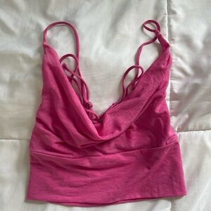 Urban outfitters pink lace-back crop top.